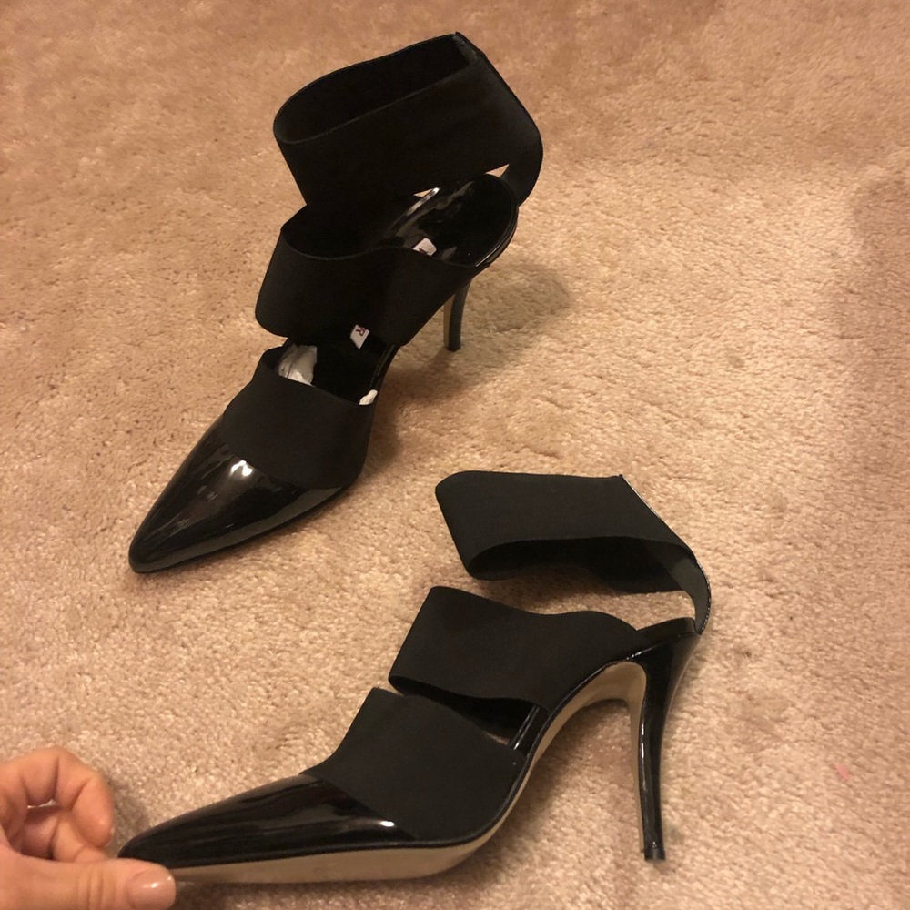 Designer black pumps